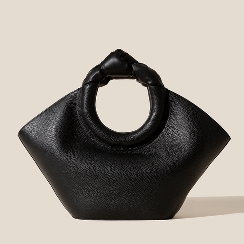 Solid Deep Black Pebbled Grain Wide Flared Carry Bag With Sculpted Knotted Circular Top Grip And Ruched Fabric Inner Storage Insert