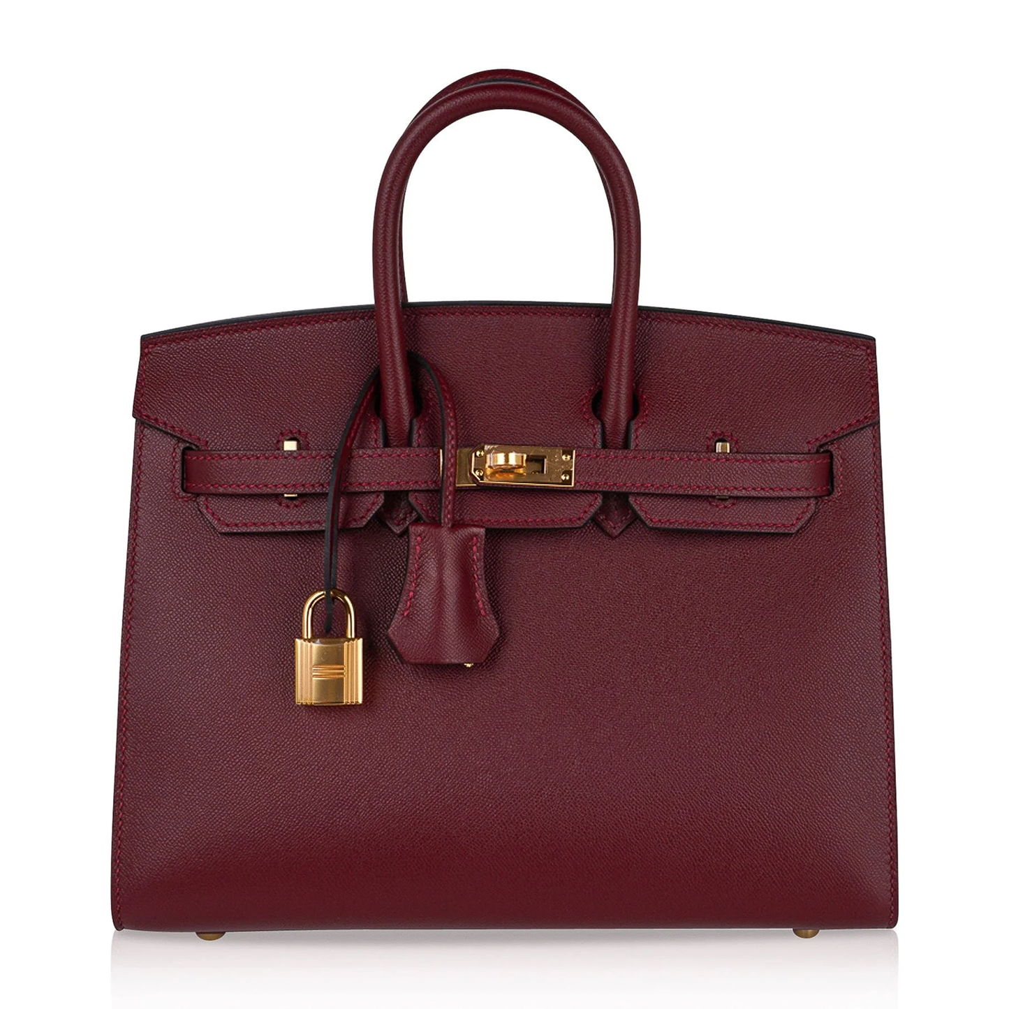 Deep Jewel Burgundy Fine Flat Grain Compact Box Structured Hand Tote With Radiant Golden Twist Lock Hardware And Matching Suspended Metal Padlock Charm