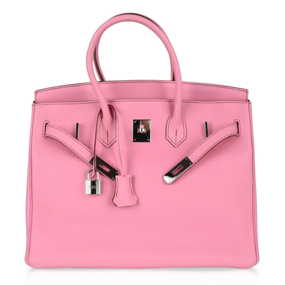 Bright Bubble Pink Subtle Textured Grain Spacious Structured Rectangular Hand Tote With Polished Silvery Twist Lock Hardware And Matching Suspended Metal Padlock Charm